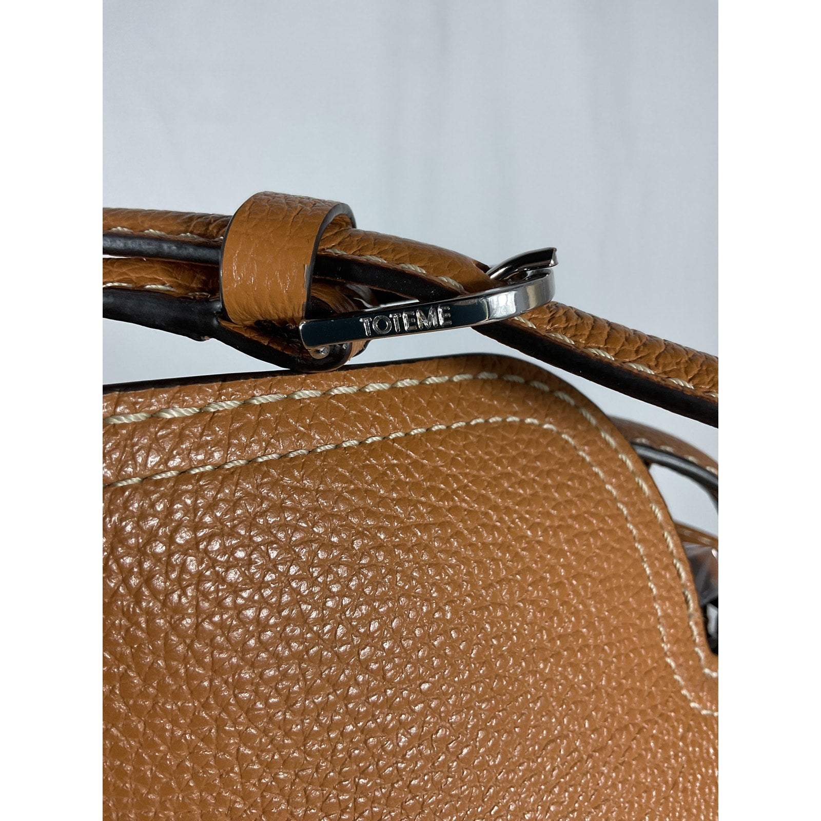 Toteme T-Lock Tan Leather Top Handle Tan Grain Clutch