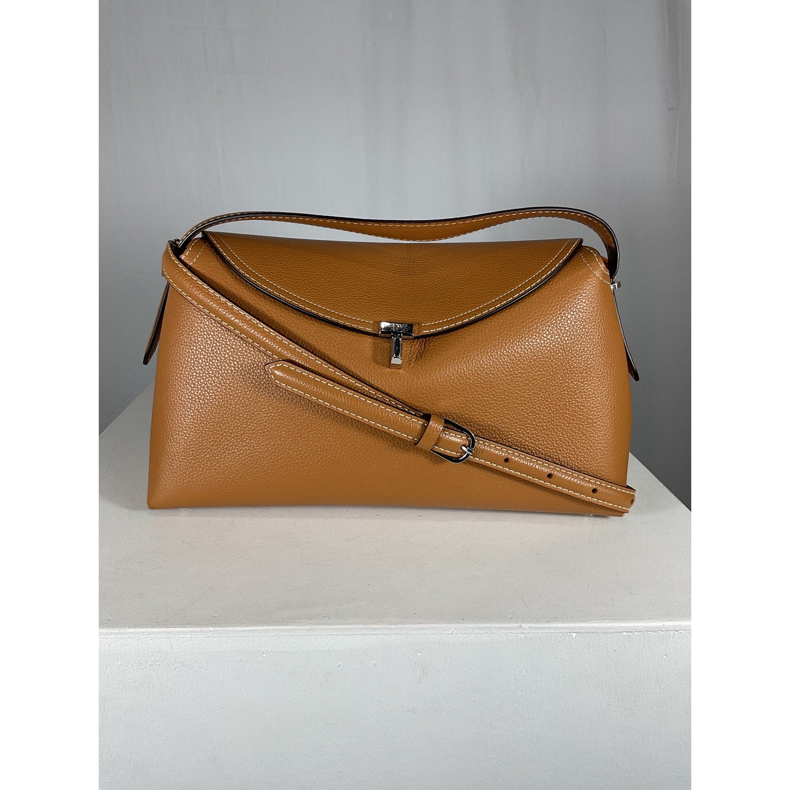 Toteme T-Lock Tan Leather Top Handle Tan Grain Clutch