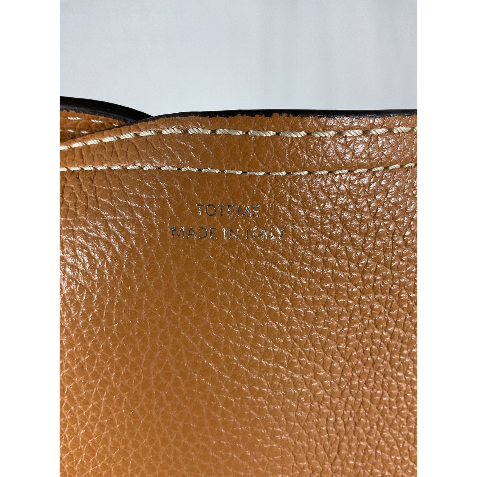 Toteme T-Lock Tan Leather Top Handle Tan Grain Clutch